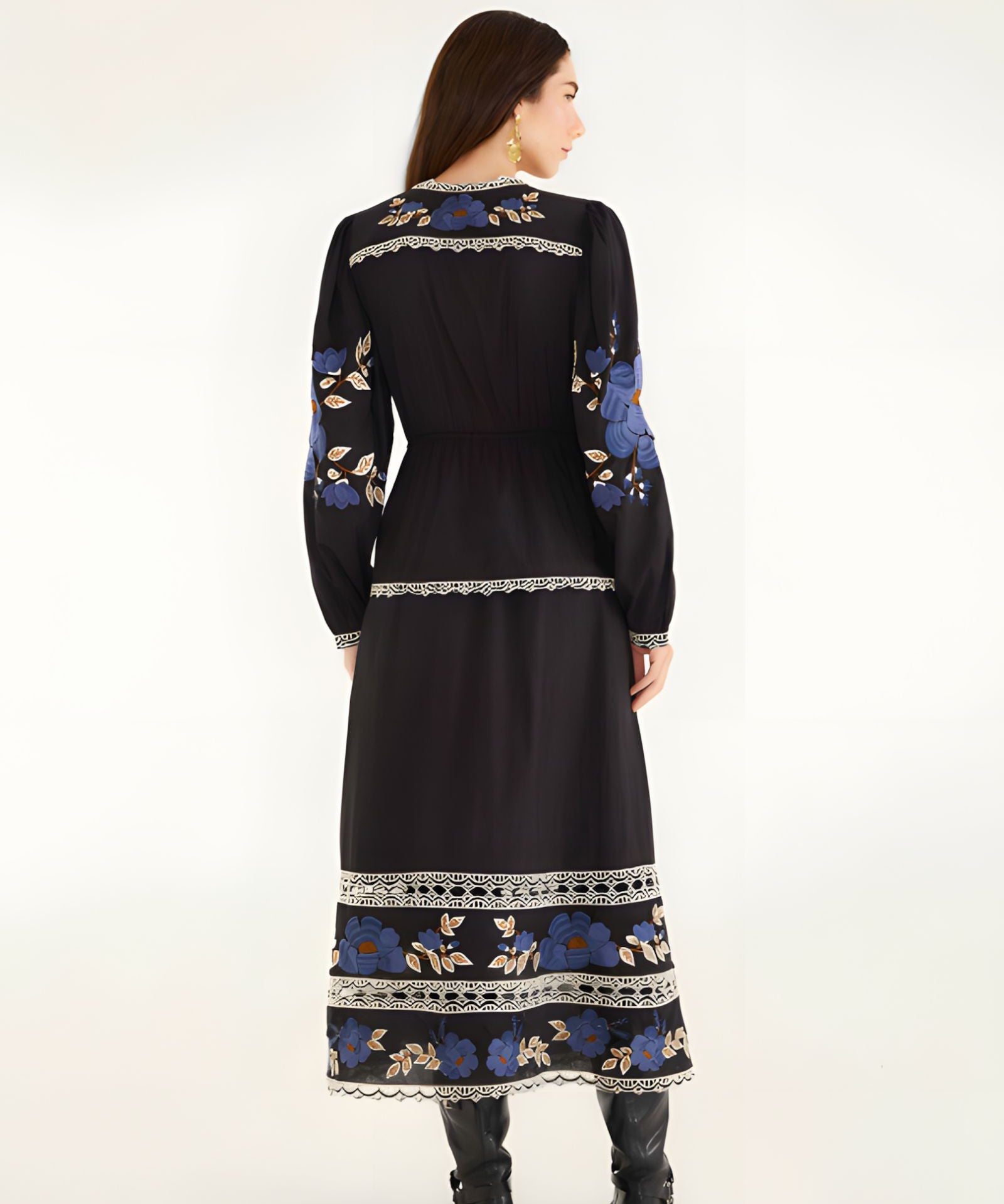 Full-length back view of the Farm Rio printed midi dress, showcasing the continuous embroidered patterns along the hem and sleeves.