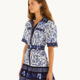 Side view of the FARM Rio Blue Porcelain Garden mini shirt dress showing the relaxed short sleeves and belted waist