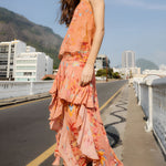 Model wearing FARM Rio mocha boho enhance ruffled maxi skirt with matching sleeveless top, full length view.