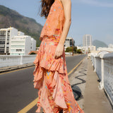 Model wearing FARM Rio mocha boho enhance ruffled maxi skirt with matching sleeveless top, full length view.
