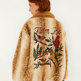Farm Rio Borbofly reversible puffer jacket with a fawn print – back view with embroidered birds and flowers