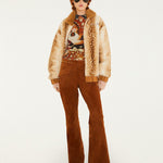 Farm Rio Borbofly reversible puffer jacket with a fawn print – full look with brown flared trousers