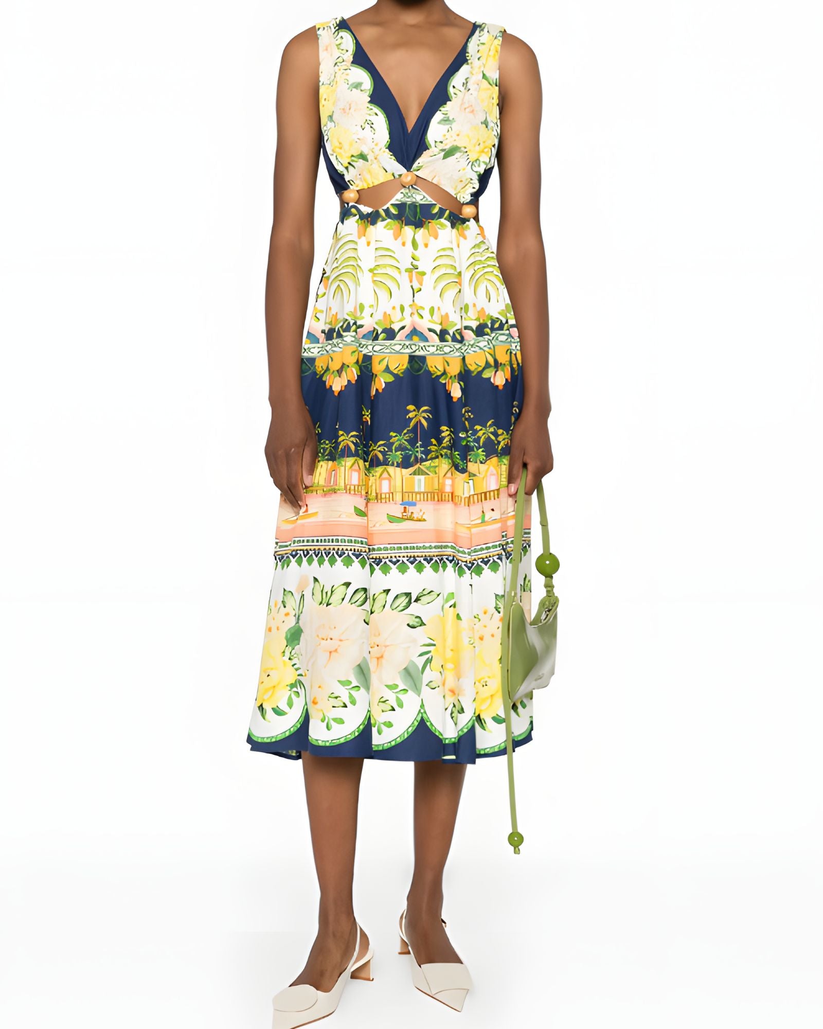 Full-length front view of a model styling the Farm Rio printed midi dress, showcasing the balance of the tropical pattern and the waist cut-outs