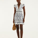 Farm Rio Flowers Arch ruffled mini dress in off-white cotton with flutter sleeves, front view