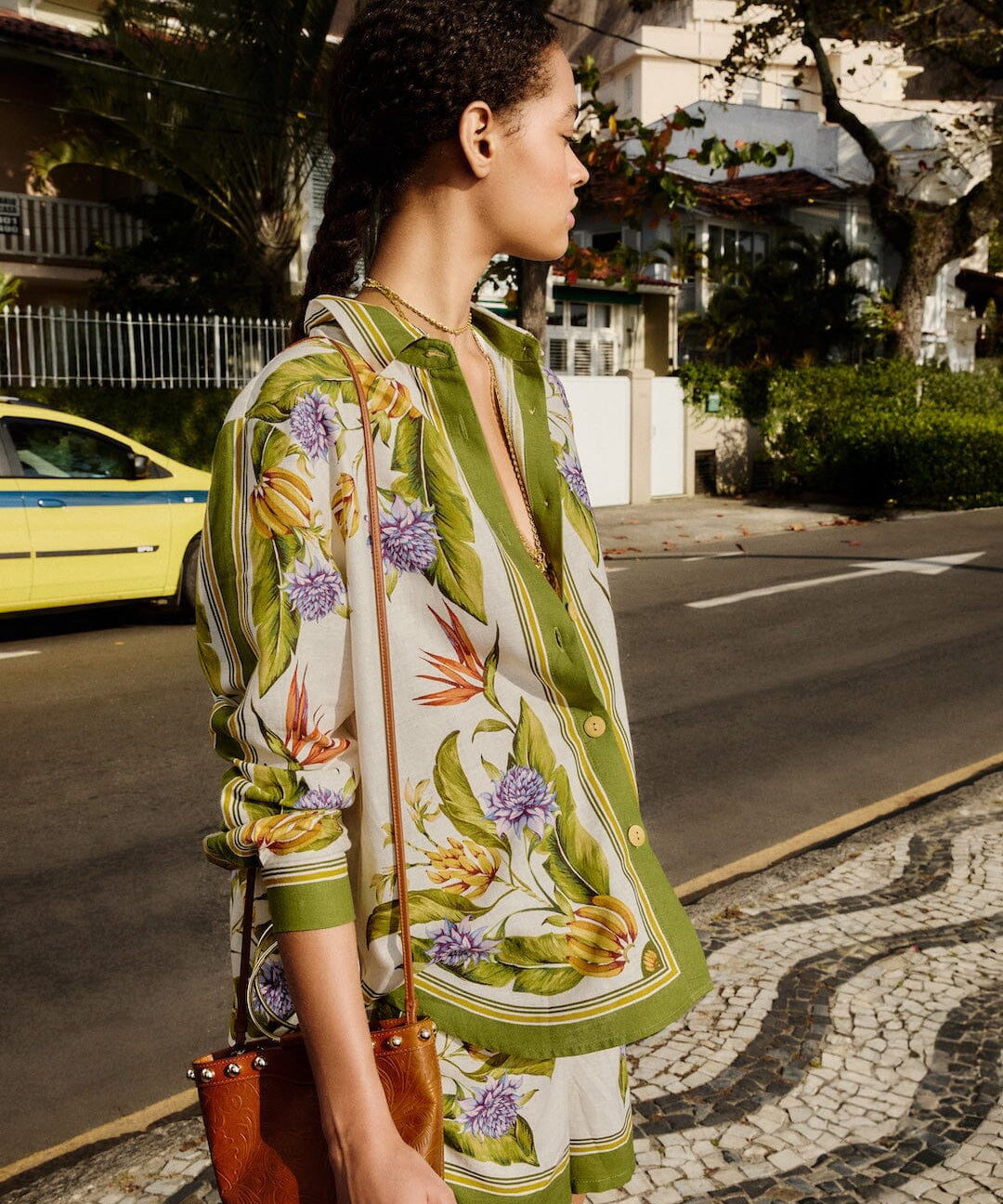 Farm Rio green botanical print shirt with tropical floral motifs, button-front design and relaxed long-sleeve silhouette.