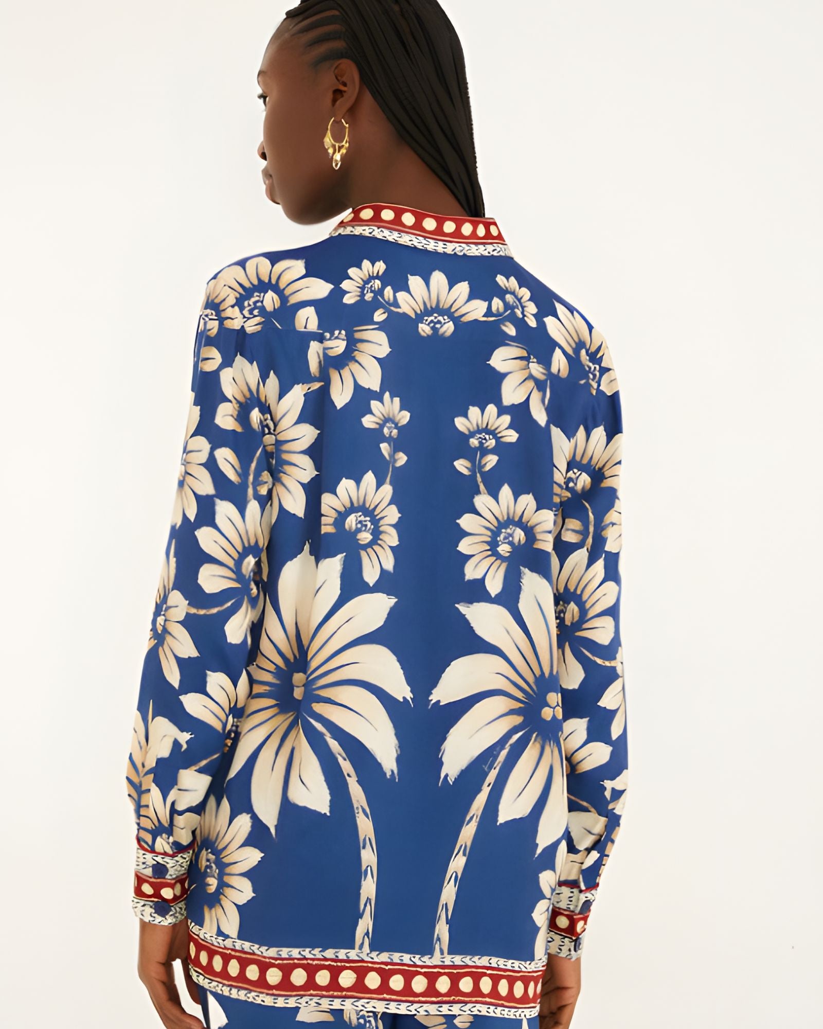 Back view of a model in a studio showcasing the continuous lunar and botanical pattern design on the FARM Rio pajama shirt.