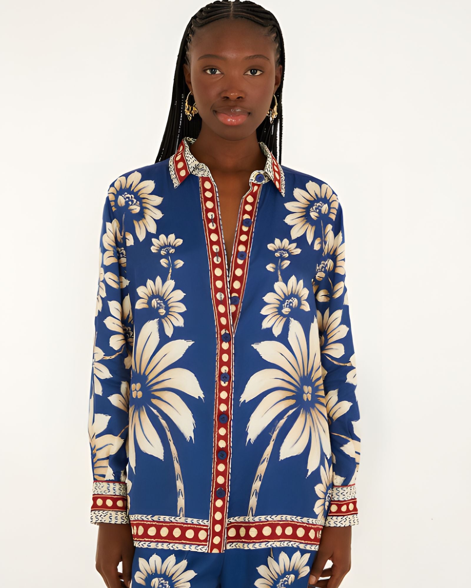 Front view of a model in a studio wearing the FARM Rio Blue Luna viscose pajama shirt with long sleeves and custom botanical print.