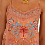 Detailed close-up of the square neckline, floral print, and delicate lace trim on the mocha FARM Rio blouse.