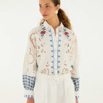 FARM Rio Off-White Richelieu Shorts view featuring intricate embroidered cutwork detailing and a tailored silhouette.