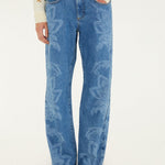 Farm Rio Tapestry Dream denim trousers with laser-engraved leaves and flowers – close-up