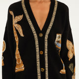 Farm Rio Vintage Souvenirs black knit cardigan with V-neck and gold buttons – close-up