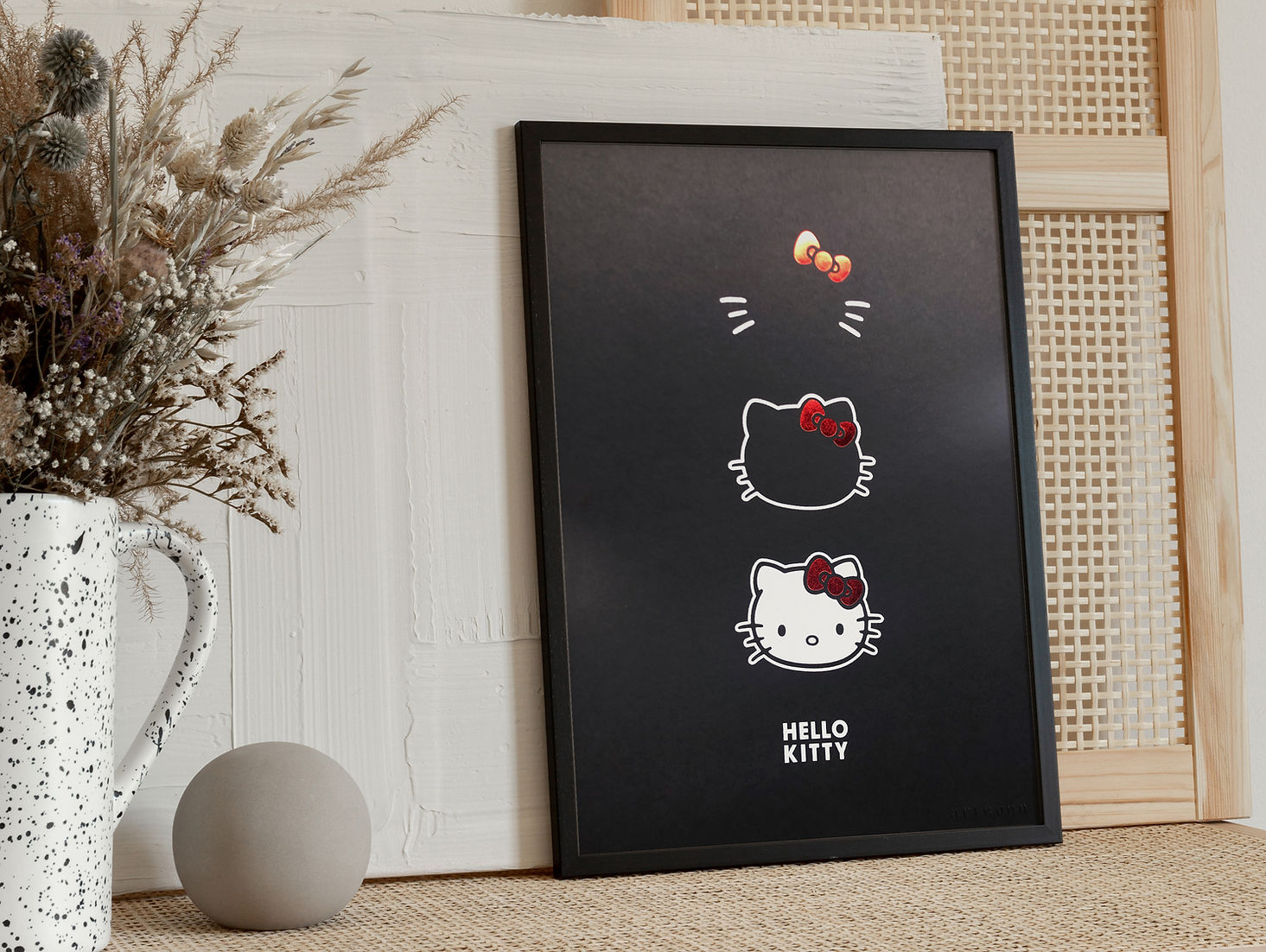 Hello Kitty Three Faces Portrait Iconic Art Print  On Black Paper In A Room