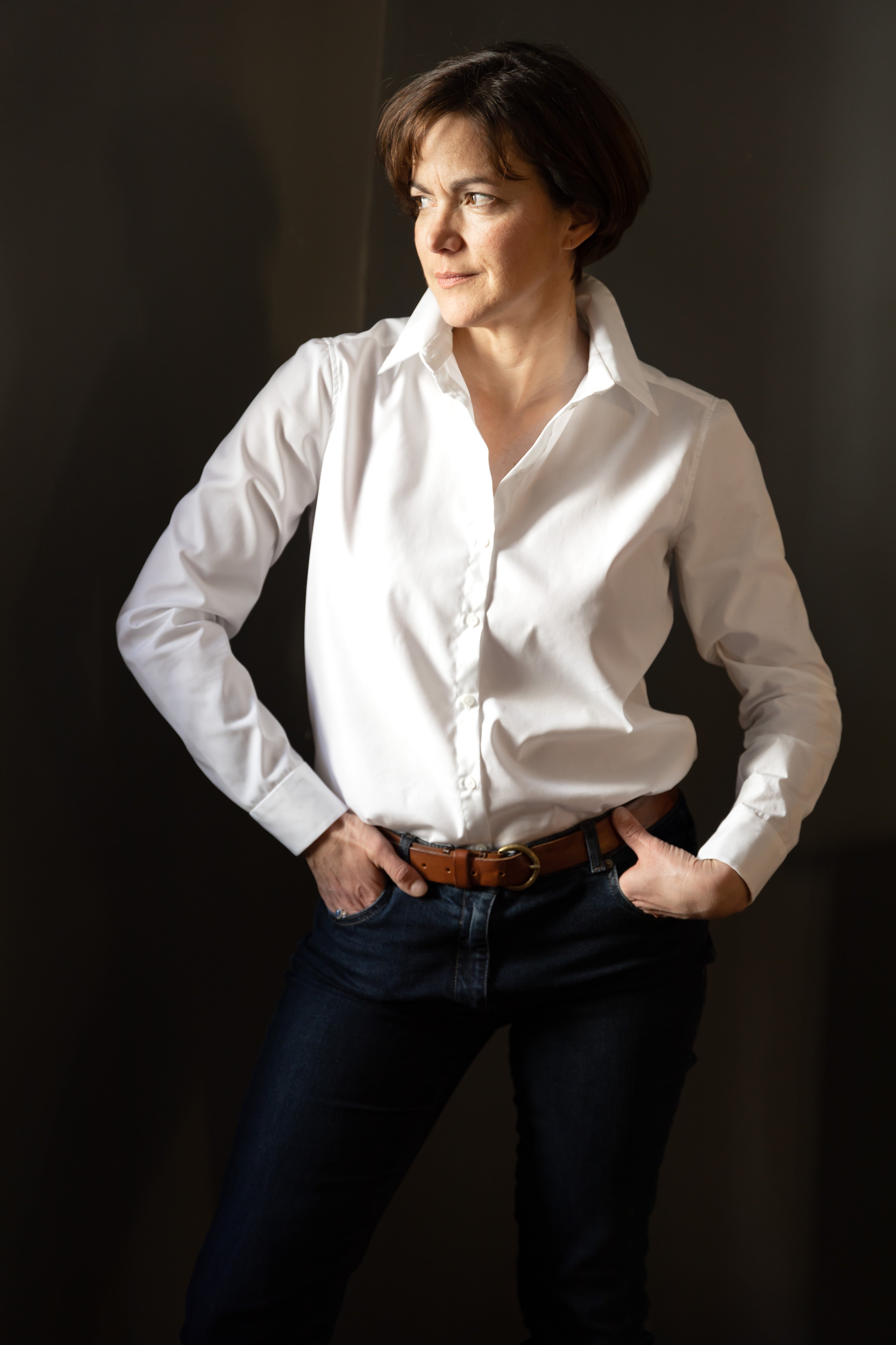 Timeless classic white women's shirt, perfect for any outfit.