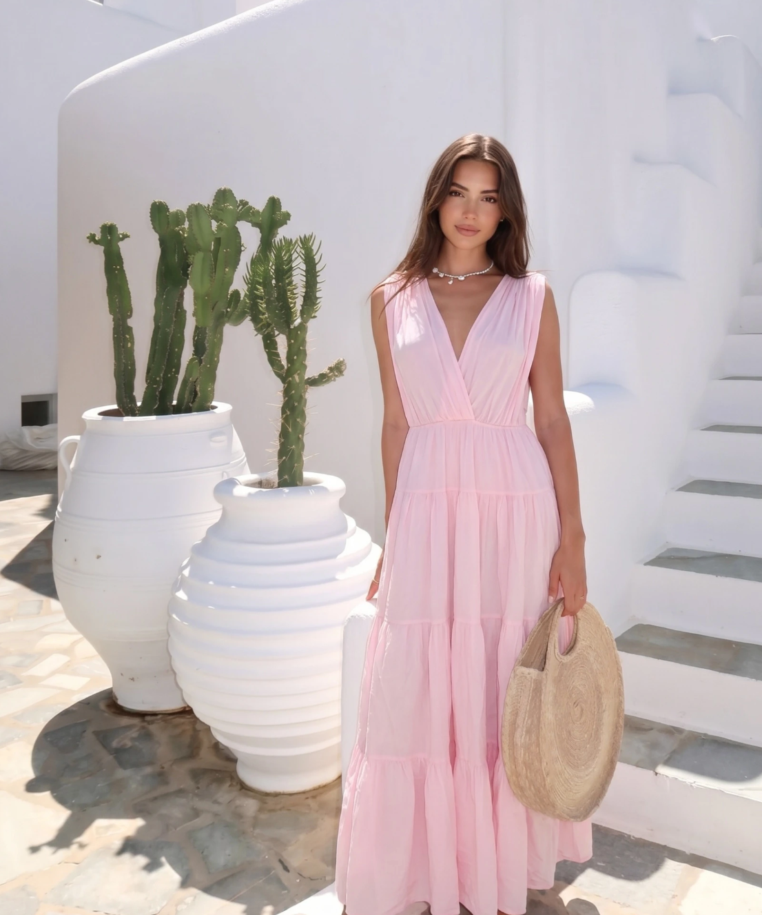Open-Back Cotton Maxi Dress by INCERTAINES — model wearing the flowing cotton dress with elegant open back, front view