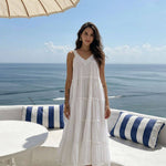 White Cotton Summer Dress by INCERTAINES — model wearing the relaxed one-size white cotton dress, front view
