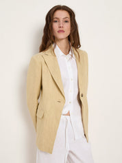 Khaki-creme single-button blazer on model, front view, worn with white shirt.