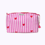 KIKOONI Love Edition pink cosmetic bag with tassel zip – angled front view