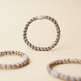 KKNEKKI slim hair tie Rose Gold & Sea Blue Mix – several hair ties together