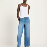 Woman wearing Lanius relaxed fit organic cotton jeans in mid blue, showing the straight wide-leg silhouette