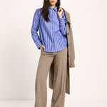 LANIUS electric blue and light blue striped shirt worn by a model