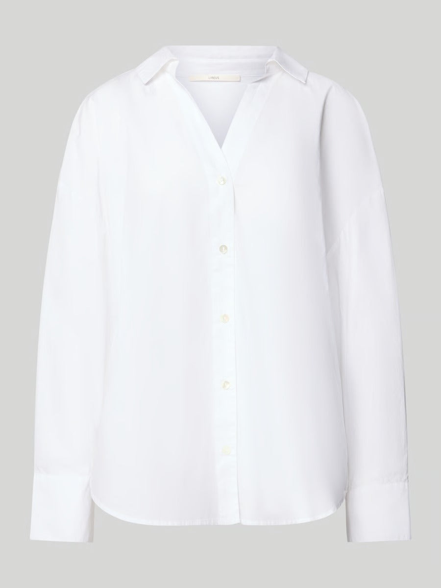 Lanius oversized white shirt showing the collar and button details