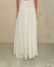 Mid-length view of the flowing cream cotton artisan maxi skirt by Mabe Apparel.