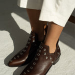 MICUIR Punky chocolate studded ankle boots worn with cream trousers