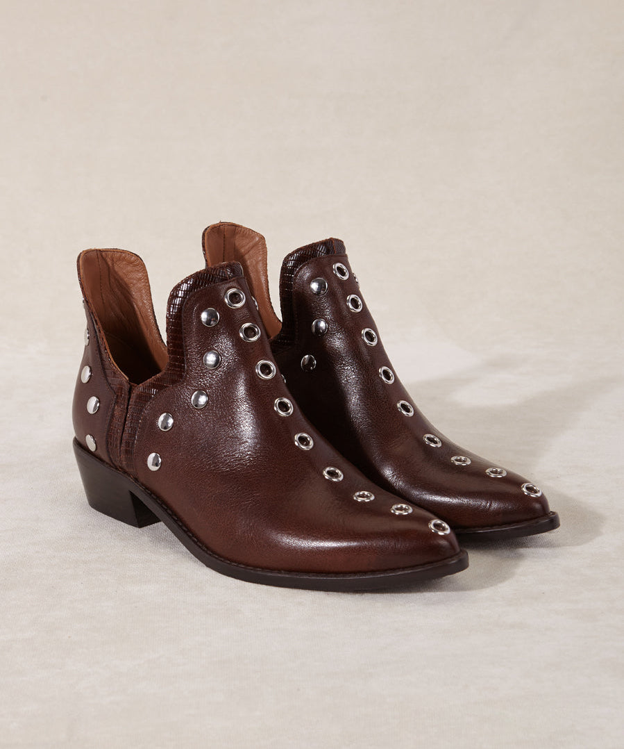 MICUIR Punky ankle boots in chocolate leather with silver studs, pair three-quarter view