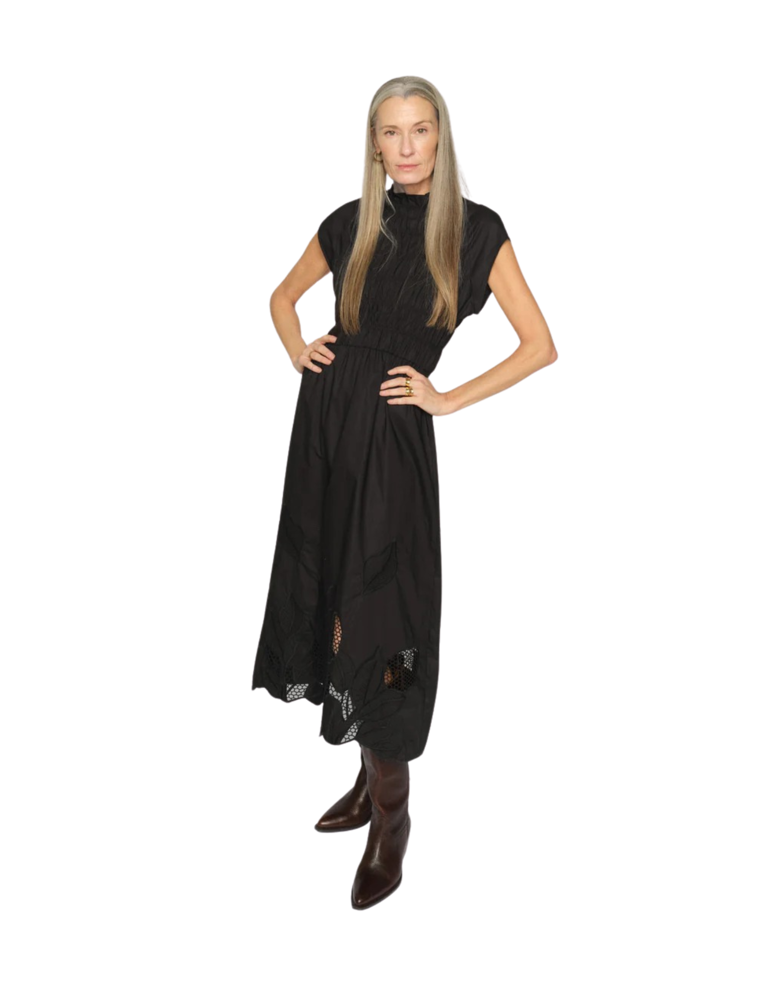 Model in motion wearing the MOS MOSH MMAria Mono dress. Highlights the flowing midi skirt and refined sleeveless cut in black organic cotton.