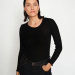Model wearing MMElaine Seamless Silk Tee in Black, front pose