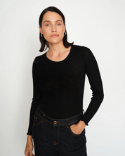 Model wearing MMElaine Seamless Silk Tee in Black, front pose