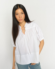 White MMTarima cotton blouse close-up showing band collar and sleeve details