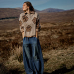 MOS MOSH Drea Popli round-neck jumper with brown jacquard roses on mottled beige, lifestyle shot