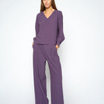 MOS MOSH Kay Miley pleated wide-leg trousers in Sweet Grape, worn by a model, front view
