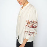 MOS MOSH Notto embroidered shirt in ecru with a band collar and openwork embroidery on the sleeves, worn by a model, front view