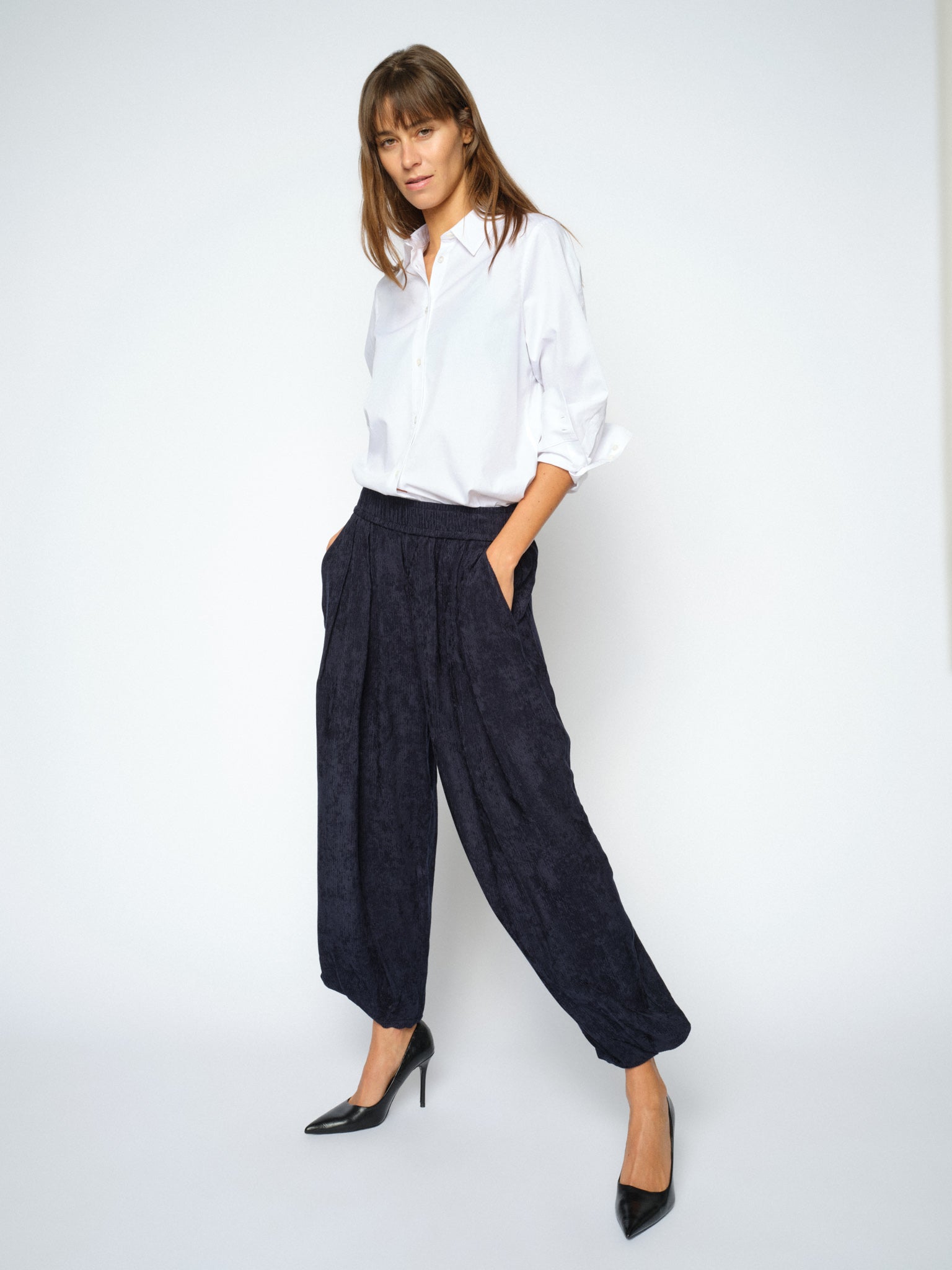 MOS MOSH Nuello Trellis 7/8 balloon trousers in salute navy with a balloon leg gathered at the ankle, worn by a model, front view