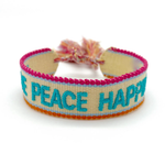 Close-up of adjustable woven turquoise friendship bracelet with embroidered “LOVE PEACE HAPPINESS” lettering and sliding knot tassel cords.