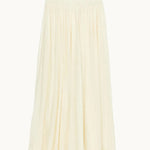 Mabe Apparel cream cotton maxi skirt with a smocked waistband and lace-trimmed hem.