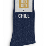 Side profile view of the navy blue glitter sock showing the comfortable elasticated ankle and the clean white CHILL wording detail.