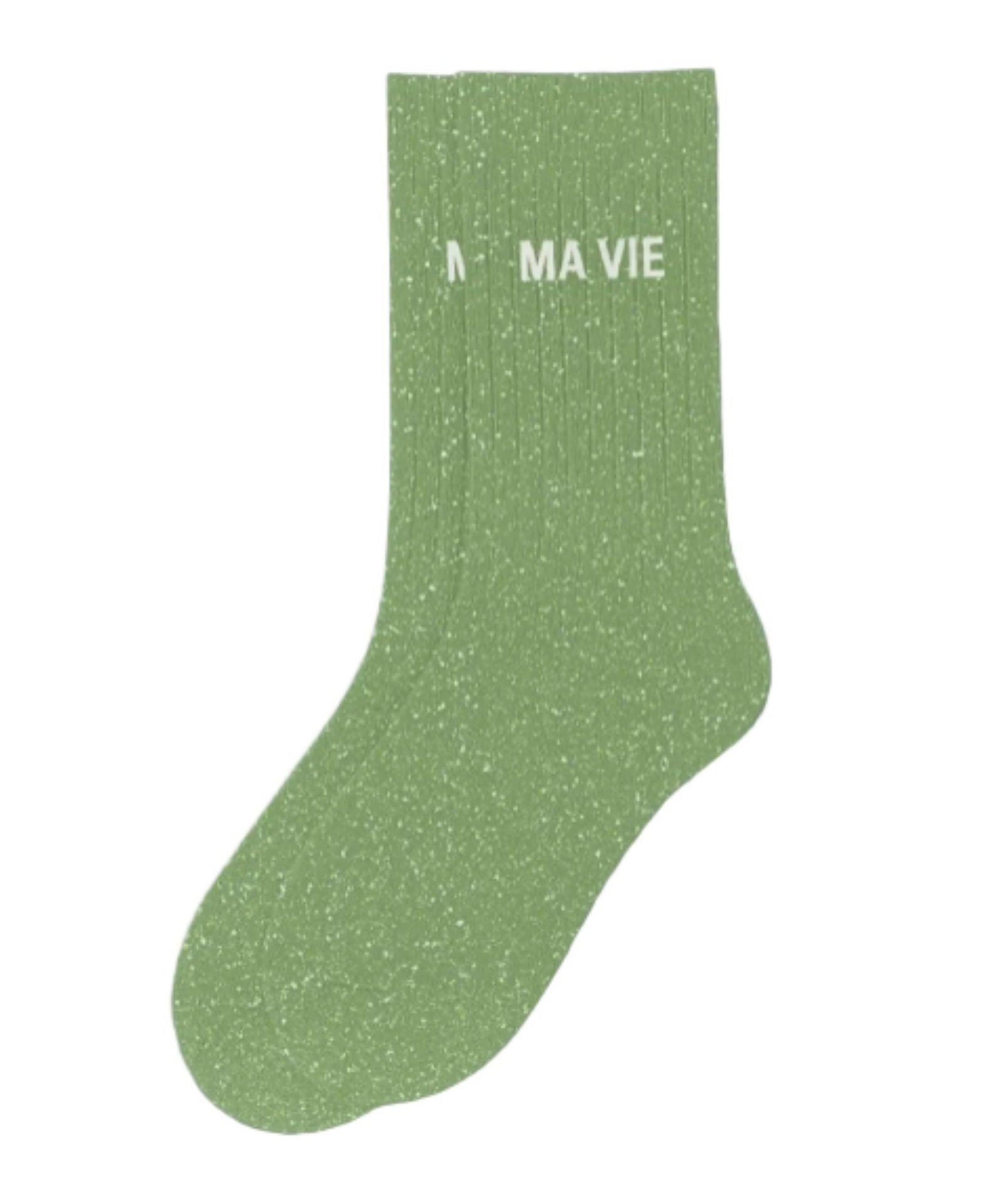 Side profile view of the almond green glitter sock showing the comfortable elasticated ankle and the clean white MA VIE wording detail.