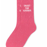Side profile view of the pink glitter sock showing the comfortable elasticated ankle and the bold white TRUST THE KARMA wording detail.