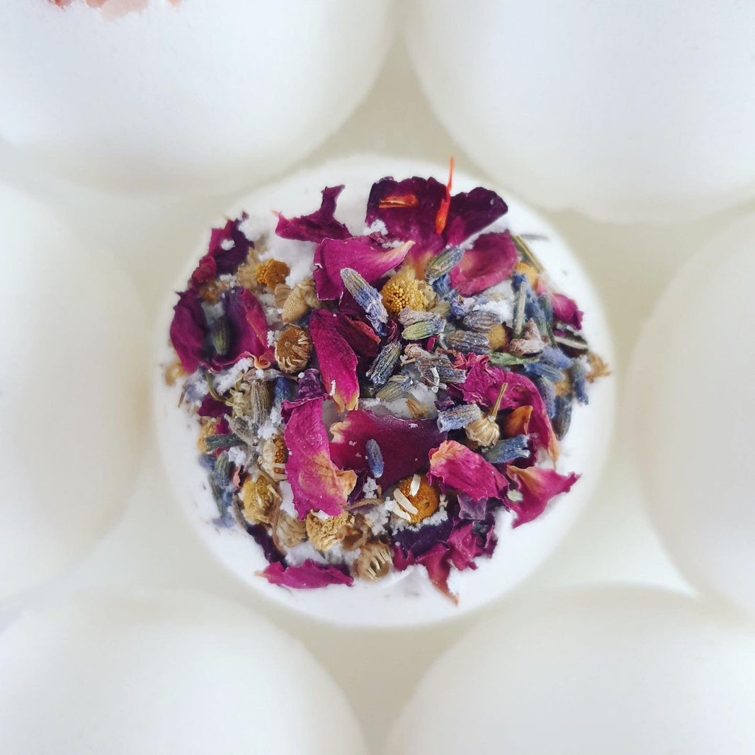 Sweet Dreams Bath Bomb, decorated with beautiful flower petals and lavender for a relaxing bath experience.