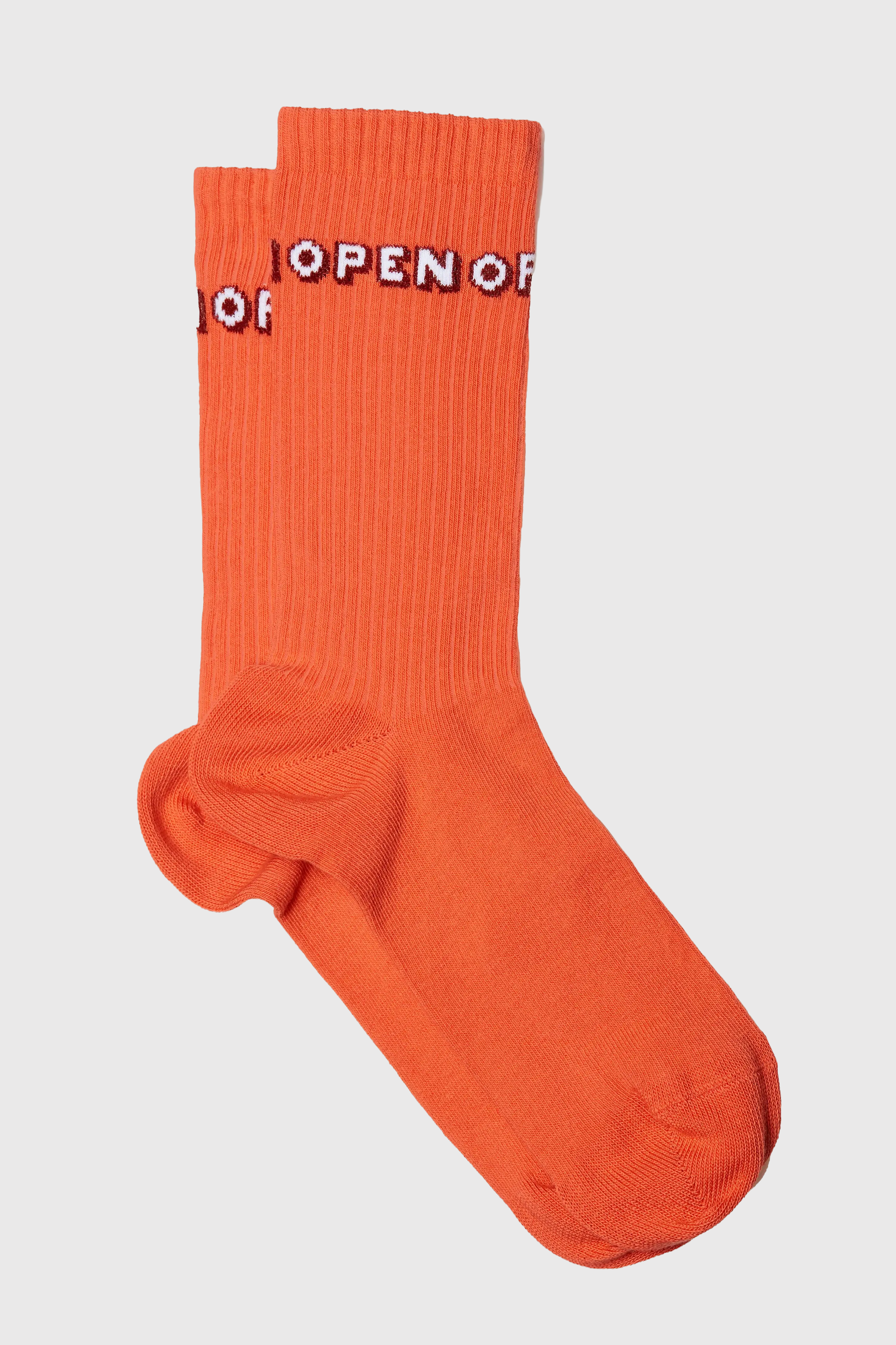 a pair of orange socks with the words openoff on them