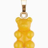 Crystal Haze Classic Nostalgia Bear pendant in yellow resin with a plain gold bail, shown on a white background