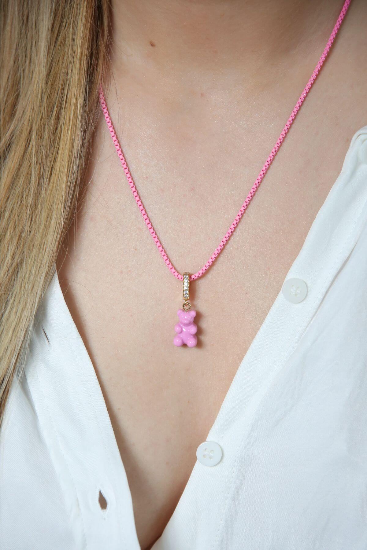 Crystal Haze Plastalina necklace in pink enamel, worn with a lilac Nostalgia Bear charm