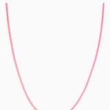 Crystal Haze Plastalina necklace in pink enamel, flat lay on a white background
