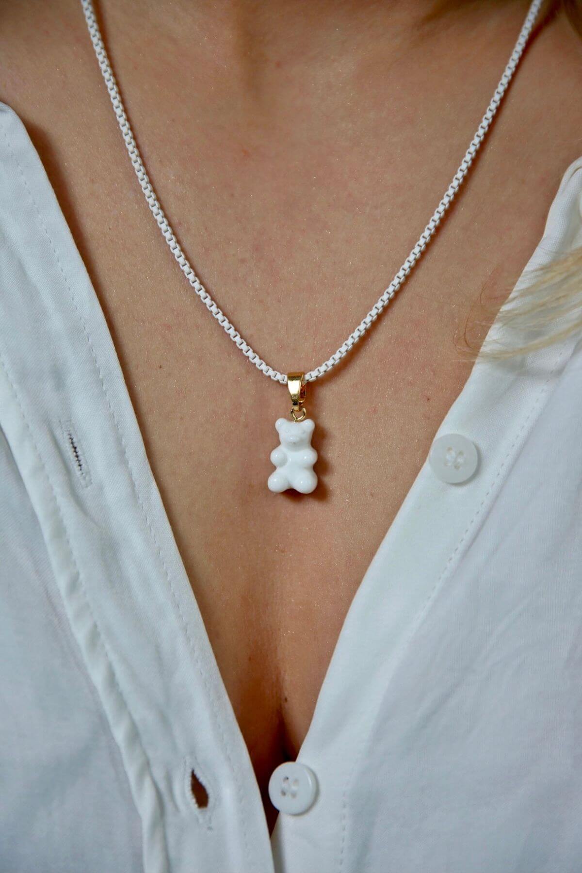 Crystal Haze Plastalina necklace in white enamel, worn with a matching white Nostalgia Bear charm