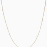 Crystal Haze Plastalina necklace in white enamel, flat lay on a white background