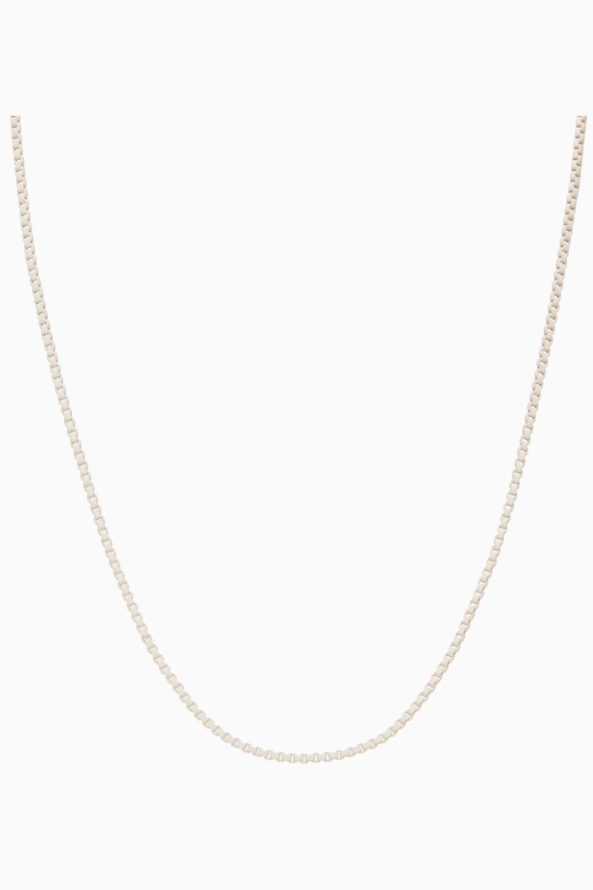Crystal Haze Plastalina necklace in white enamel, flat lay on a white background