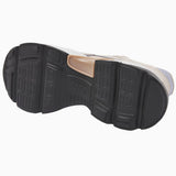 Underside of the Nubikk Ross Trek beige sneaker, showing the black-and-white EVA tread.